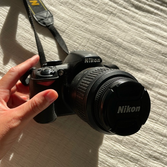 Nikon D3100 with camera bag, charger, lens, and tripod - Picture 2 of 9